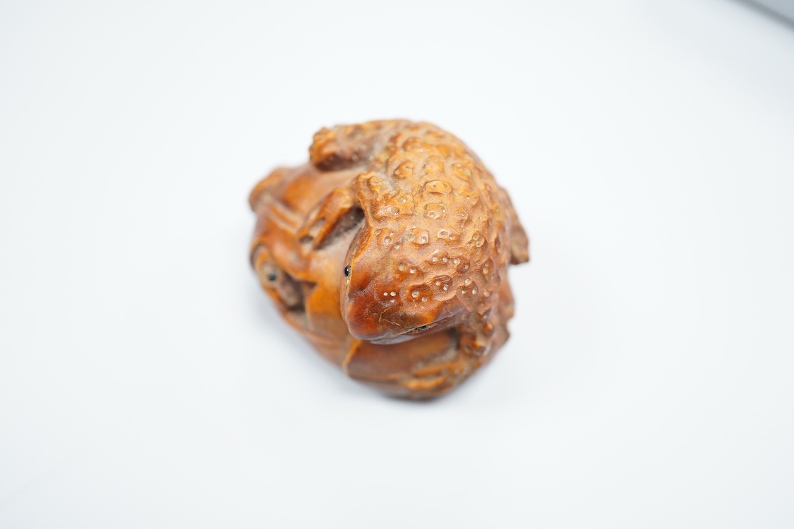 Three carved hardwood netsuke, signed